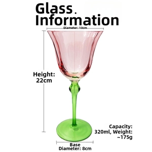 Detail of pink crystal wine glass with green stem showing 22cm height and 10cm diameter