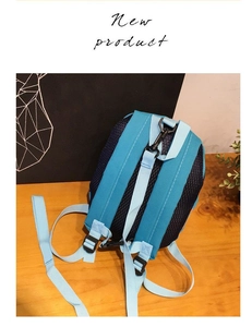 Detail view of the breathable mesh back and sturdy D-ring on the dinosaur toddler backpack