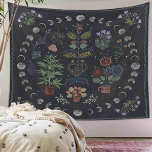 Detail of bohemian moon phase tapestry with hand-drawn floral and botanical patterns