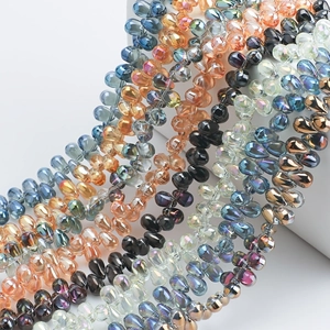 Macro detail of teardrop glass crystal beads with iridescent AB coating for jewelry DIY
