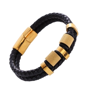 Men's double-layered black woven leather bracelet with gold magnetic clasp and textured rings