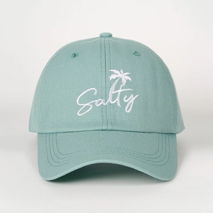 Adjustable mint green cotton baseball cap featuring embroidered Salty text and palm tree