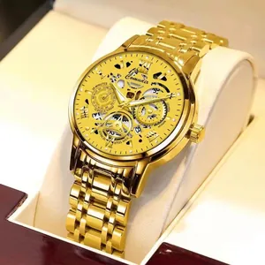 Macro shot of gold-plated skeletal mechanical watch with intricate movement and steel band