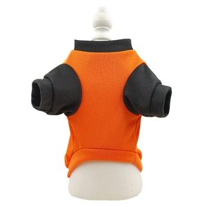 Detail of pet T-shirt featuring orange body with black ribbed collar and sleeves