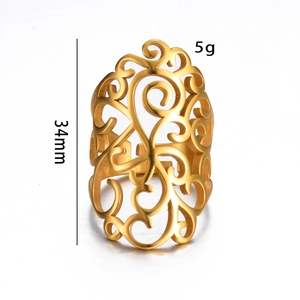 Detail view of large hollow pattern ring in gold finish showing 34mm height and 5g weight