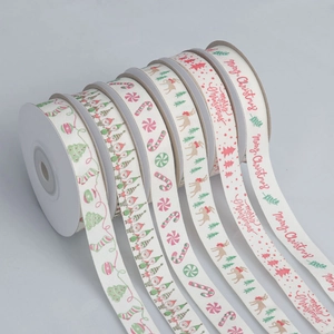 Detail of Christmas ribbons with festive patterns for gift wrapping and holiday decor