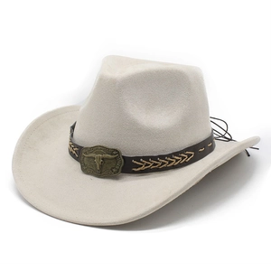 Detail of cream western cowboy hat with brown leather band and metallic bull skull buckle