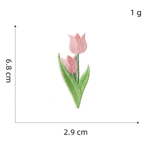 Pink tulip flower embroidery patch for DIY decoration with 6.8 cm by 2.9 cm dimensions