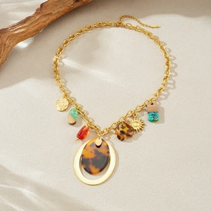 Bohemian gold chain necklace with leopard print acetate and sun pendant charms