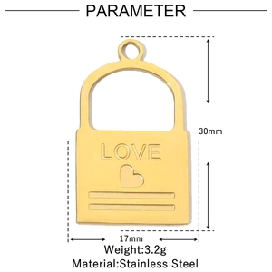 Macro detail of a 30mm gold heart lock pendant in stainless steel with LOVE engraving