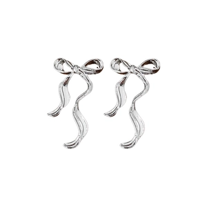 Elegant silver bow stud earrings with fluid ribbon design in minimalist style for women