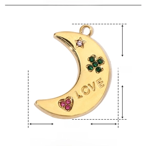 Detail of gold moon pendant with colorful rhinestones and product dimensions