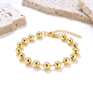 Minimalist polished gold beaded bracelet with lobster clasp and adjustable link chain