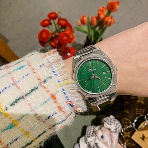 Stylish square silver stainless steel watch with a vibrant green dial and date display
