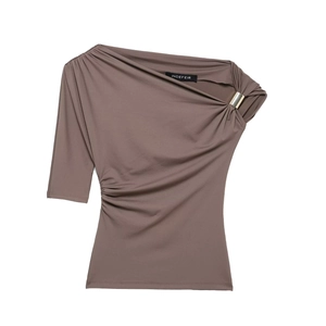 Detail view of taupe one-shoulder top showing gold metal ring and side ruched texture