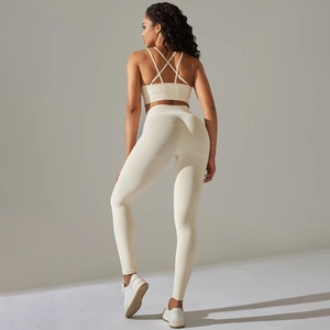 Ensemble de yoga côtelé crème avec brassière dos croisé et legging taille haute femme