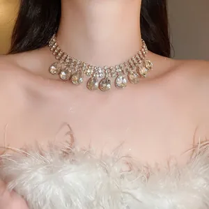 Elegant rhinestone choker necklace with sparkling waterdrop tassels and gold finish