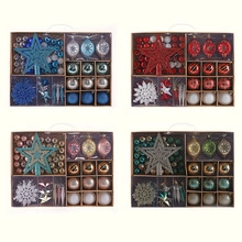 Detail of assorted Christmas tree ornaments in four colors including stars and snowflakes