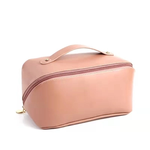 Large capacity pink PU leather accordion makeup bag with golden zipper and top handle