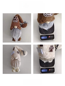Detail of cute dog-themed gnomes in brown and beige with woof embroidery and weight display