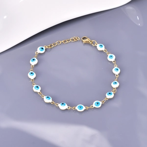 Bohemian gold stainless steel O-chain bracelet with blue evil eye charms and lobster clasp