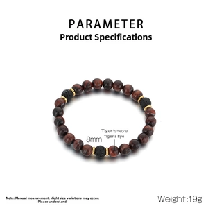 Detailed view of 8mm red tiger eye and black lava stone beads with gold metal spacers