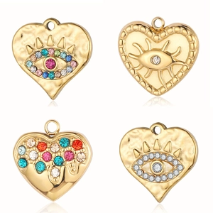 Golden heart-shaped devil eye pendants with colorful rhinestones and shell inlay