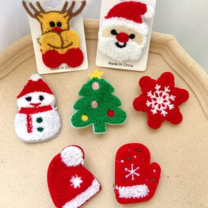 7-piece Christmas towel embroidery pin set featuring Santa, reindeer, and tree icons