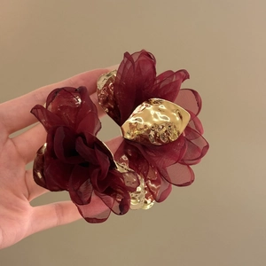 Elegant burgundy chiffon flower hair scrunchie with a polished gold metallic charm