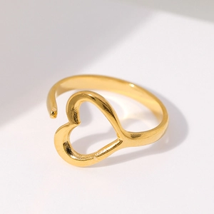 Minimalist gold heart-shaped open ring in stainless steel for women on white background