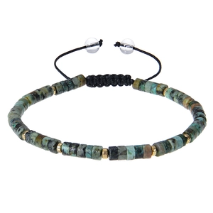 Detailed close-up of woven natural turquoise stone beads and adjustable pull string
