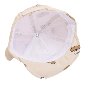 Beige baby corduroy hat with dog print showing internal structure and sweatband