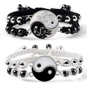 Adjustable Yin Yang Tai Chi woven bracelets with dragon totem charms in black and white