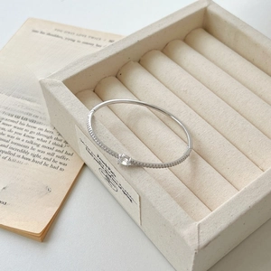 Detail of S925 sterling silver bracelet with pear-shaped cubic zirconia in a jewelry box