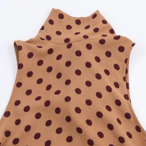Polka dot sleeveless high neck midi dress in khaki and dark brown with smooth fabric texture
