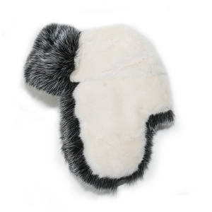 Detailed close-up of a plush black and white faux fur winter trapper hat for women