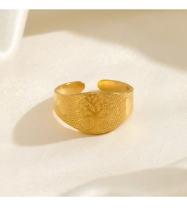 Macro shot of 18k gold plated stainless steel tree of life ring with mesh texture detail