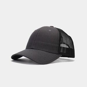 Detail of dark grey truck hat featuring breathable black mesh back and curved brim