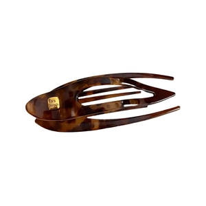 Durable tortoiseshell PC hair clip with golden fashion detail on white background