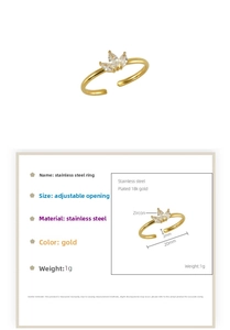 Détails techniques de la bague en acier doré avec zircone marquise et tableau des mesures