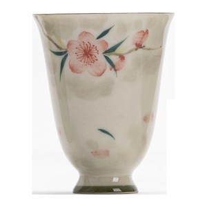 Hand-painted peach blossom ceramic teacup with high green base on a clean white background