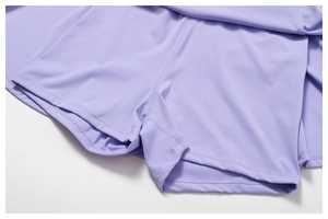 Close-up of lavender athletic dress featuring built-in safety shorts and flatlock seams