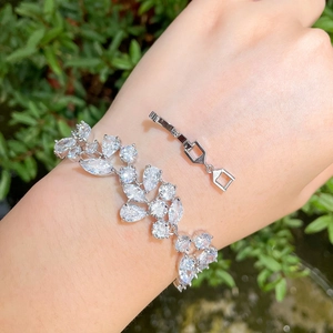 Elegant silver bracelet with marquise-cut zircons and extra clasp shown in nature