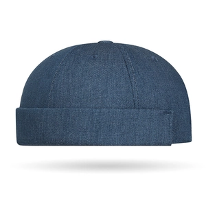 Classic dark blue denim docker hat with a cuffed brim and vintage round crown