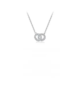 Detail of s925 silver interlocking double ring necklace with cubic zirconia pave