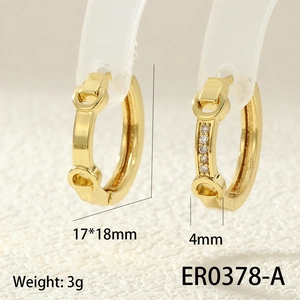 Macro shot of 18K gold plated horseshoe buckle earrings with micro-inlaid zircon
