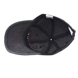 Detail view of the 100% cotton inner lining and stitching of the washed baseball cap