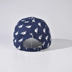 Rear view of navy blue baseball cap with white pigeon patterns and silver metal buckle