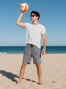 Detail of gray athletic shorts with drawstring waist and zipper pockets for men