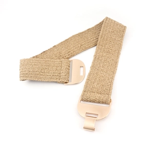 Detail of khaki braided elastic belt featuring a polished gold metal interlocking buckle
